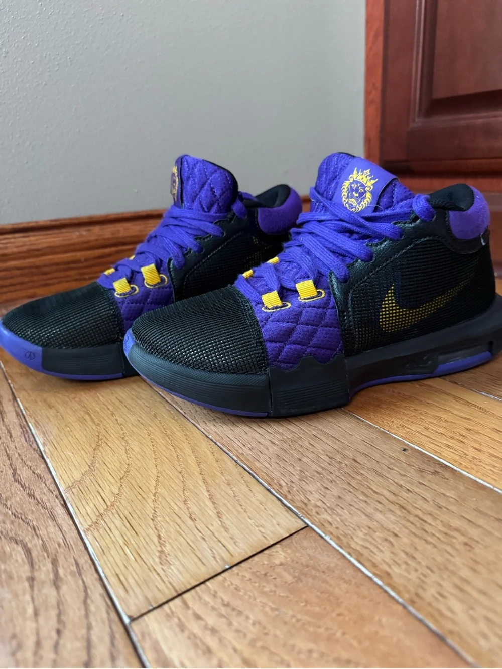 Nike Kids Black and Purple High-Top Sneakers with Yellow Accents